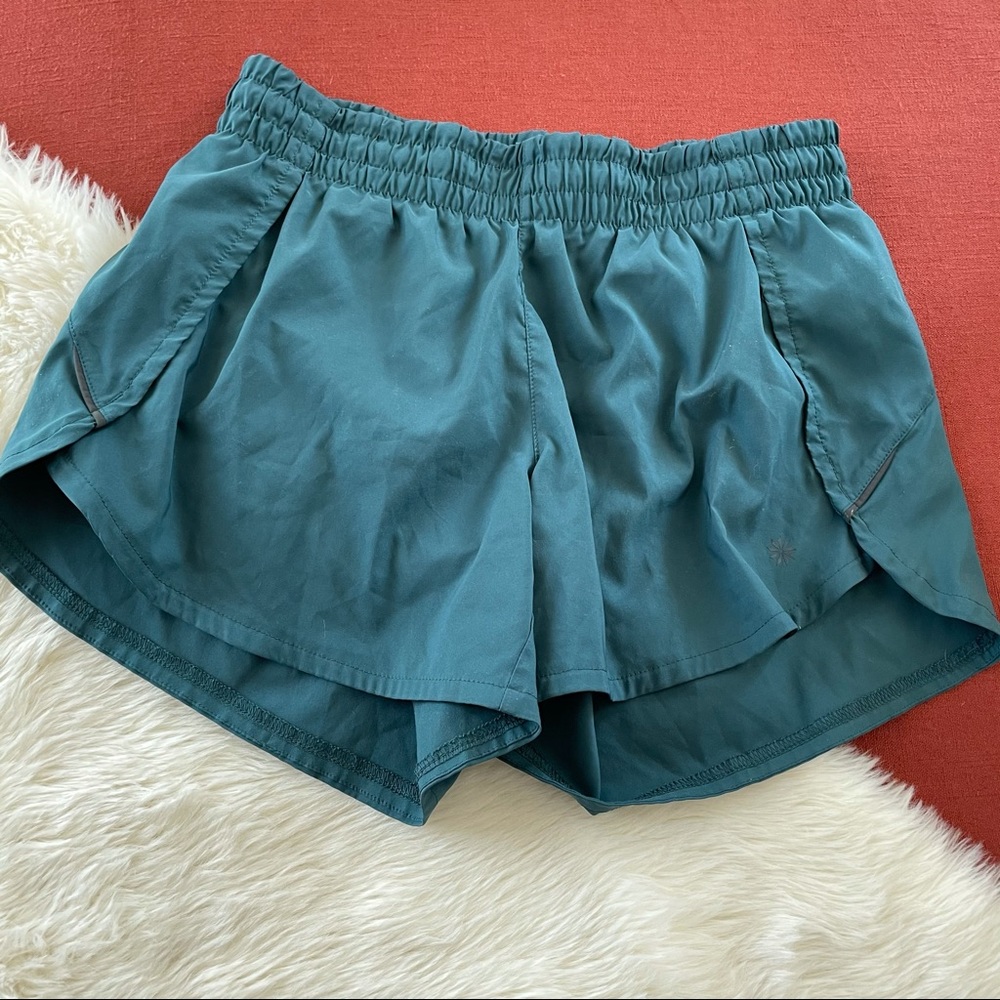 Athleta Kelly green racer run shorts sz.S